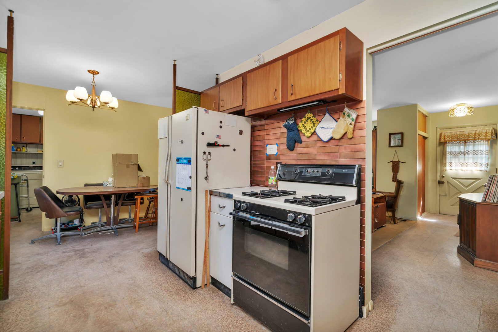 96 South Street Cary, IL 60013 - Photo 8 of 14 a kitchen with a stove and a refrigerator