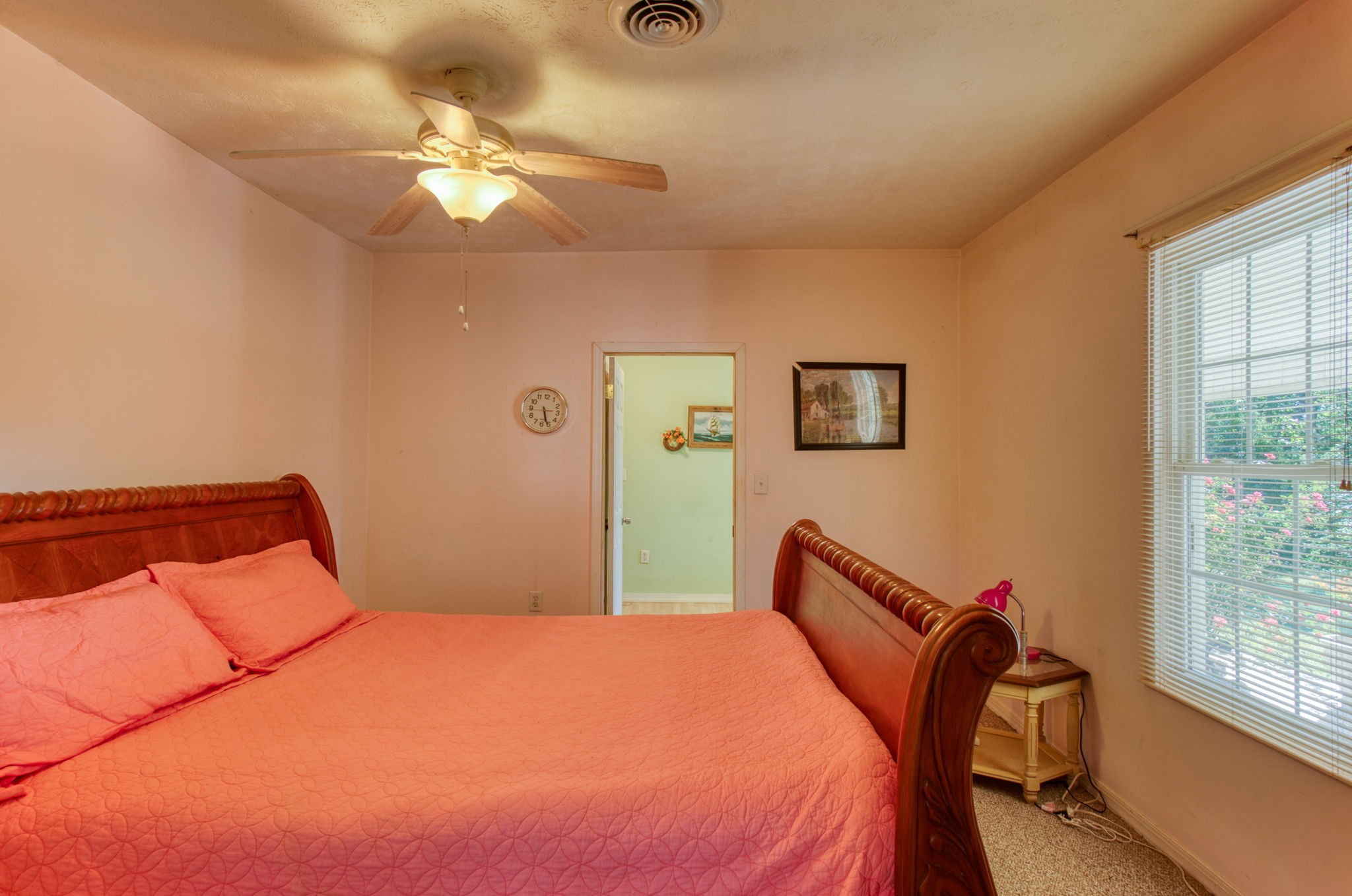 15755 Tucker Ridge Road Silver Point, TN 38582 - Photo 48 of 70 a bedroom with a bed and a chandelier