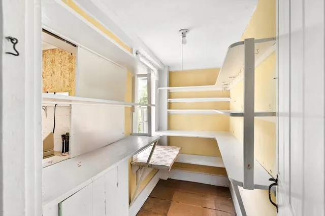 a view of front door and bedroom