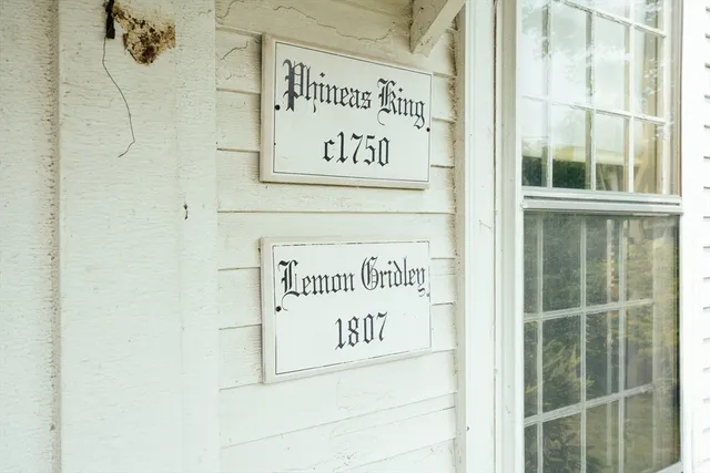 a sign on the wall of a building