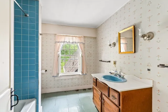 a bathroom with a sink and a bathtub