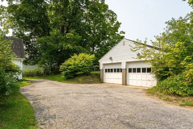 a house with trees in the background