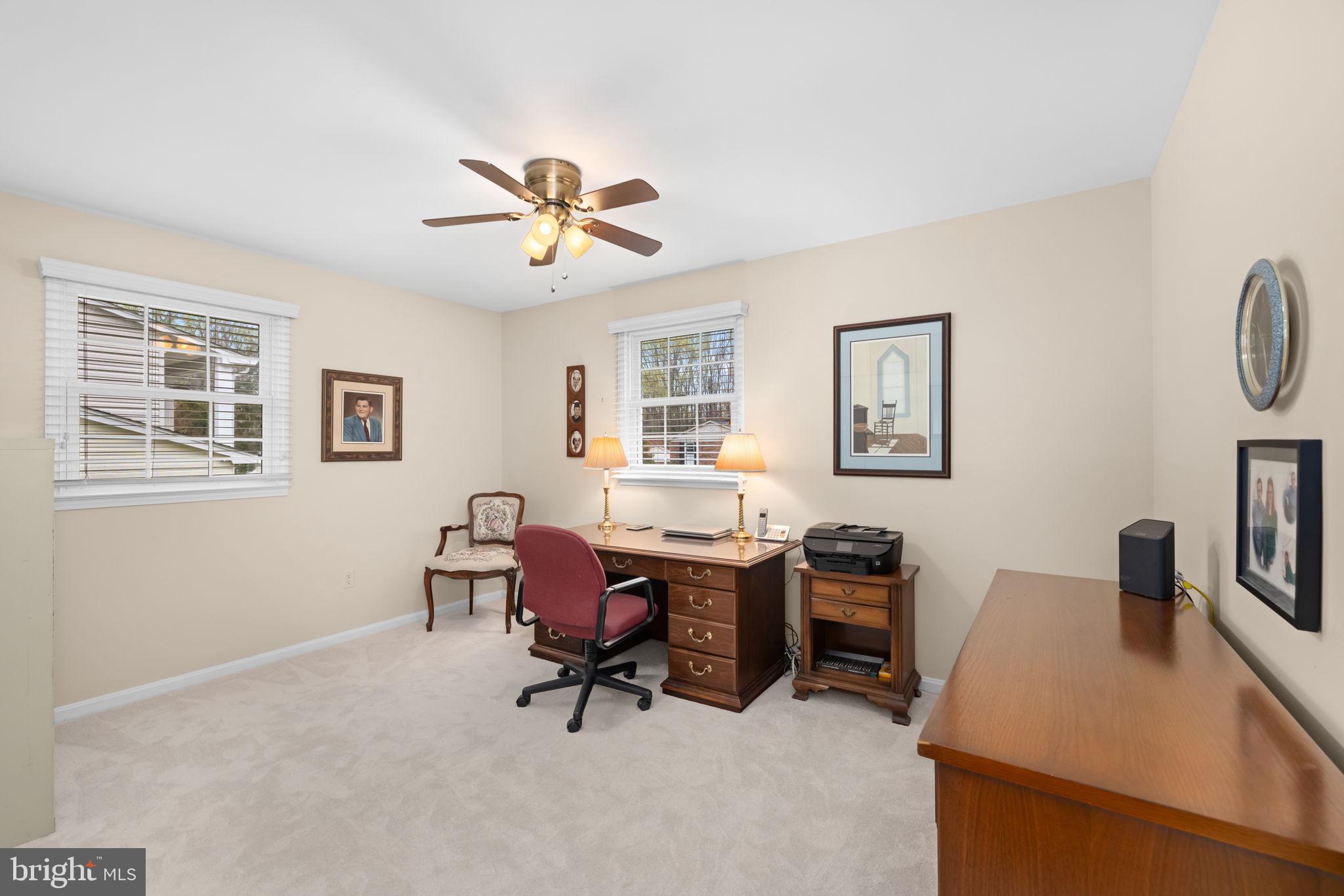 6964 Conservation Drive Springfield, VA 22153 - Photo 30 of 57 a workspace with chandelier