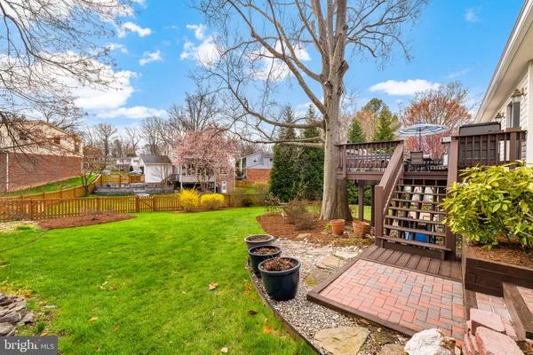 a view of a house with a yard porch and sitting area