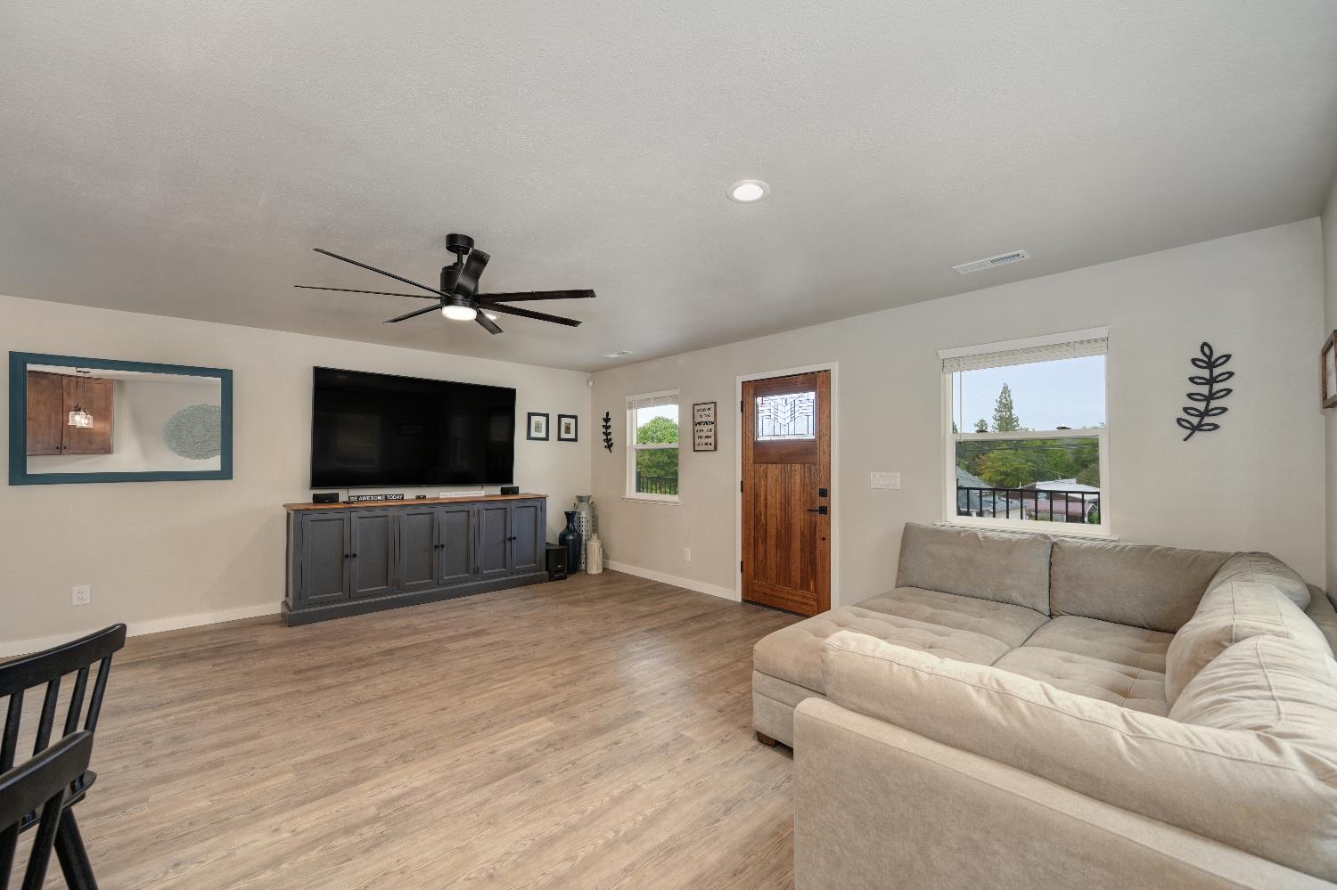 314 East Main Street Ione, CA 95640 - Photo 15 of 43 a living room with furniture and a flat screen tv