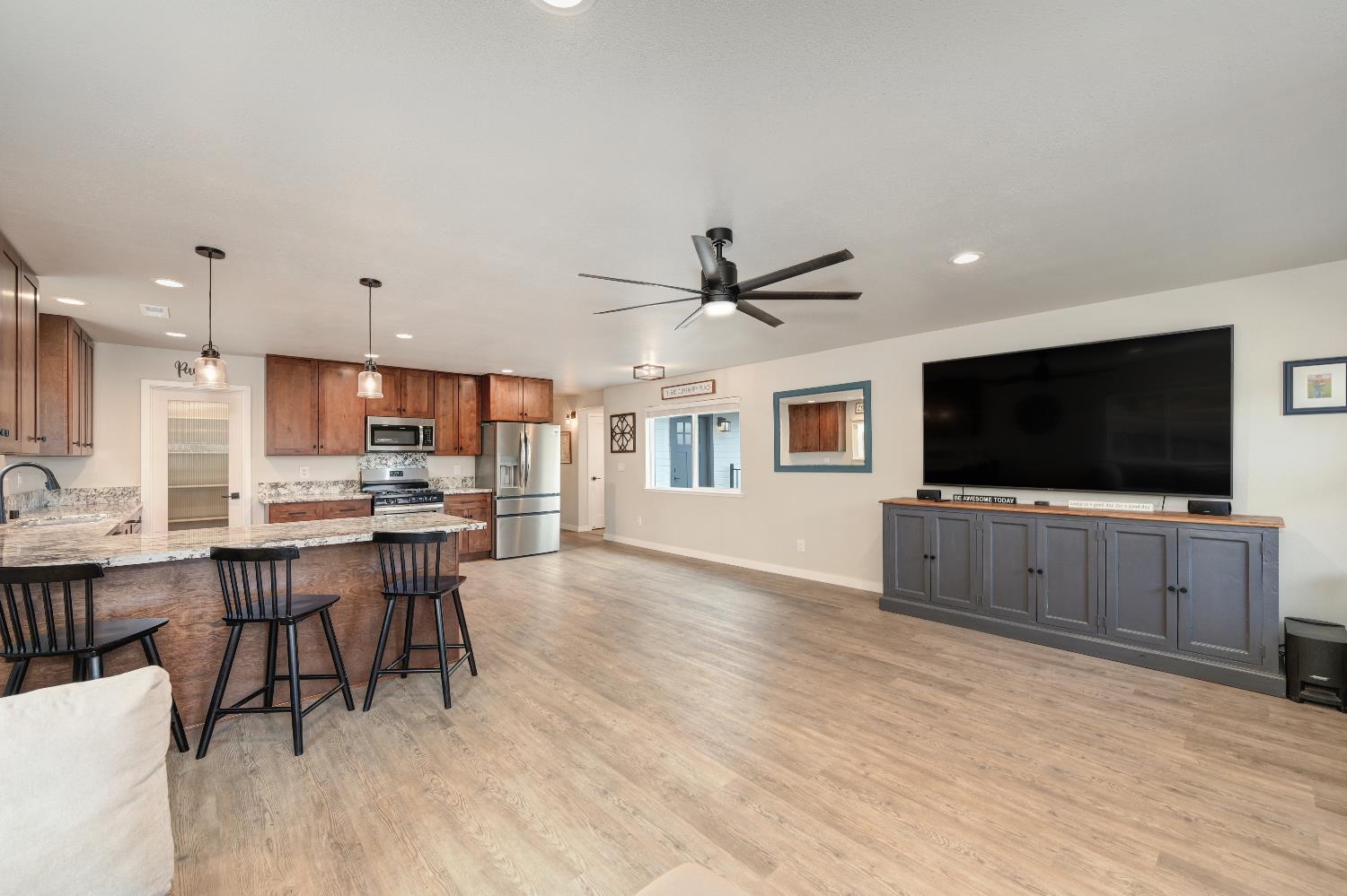 314 East Main Street Ione, CA 95640 - Photo 16 of 43 a living room with furniture and a flat screen tv