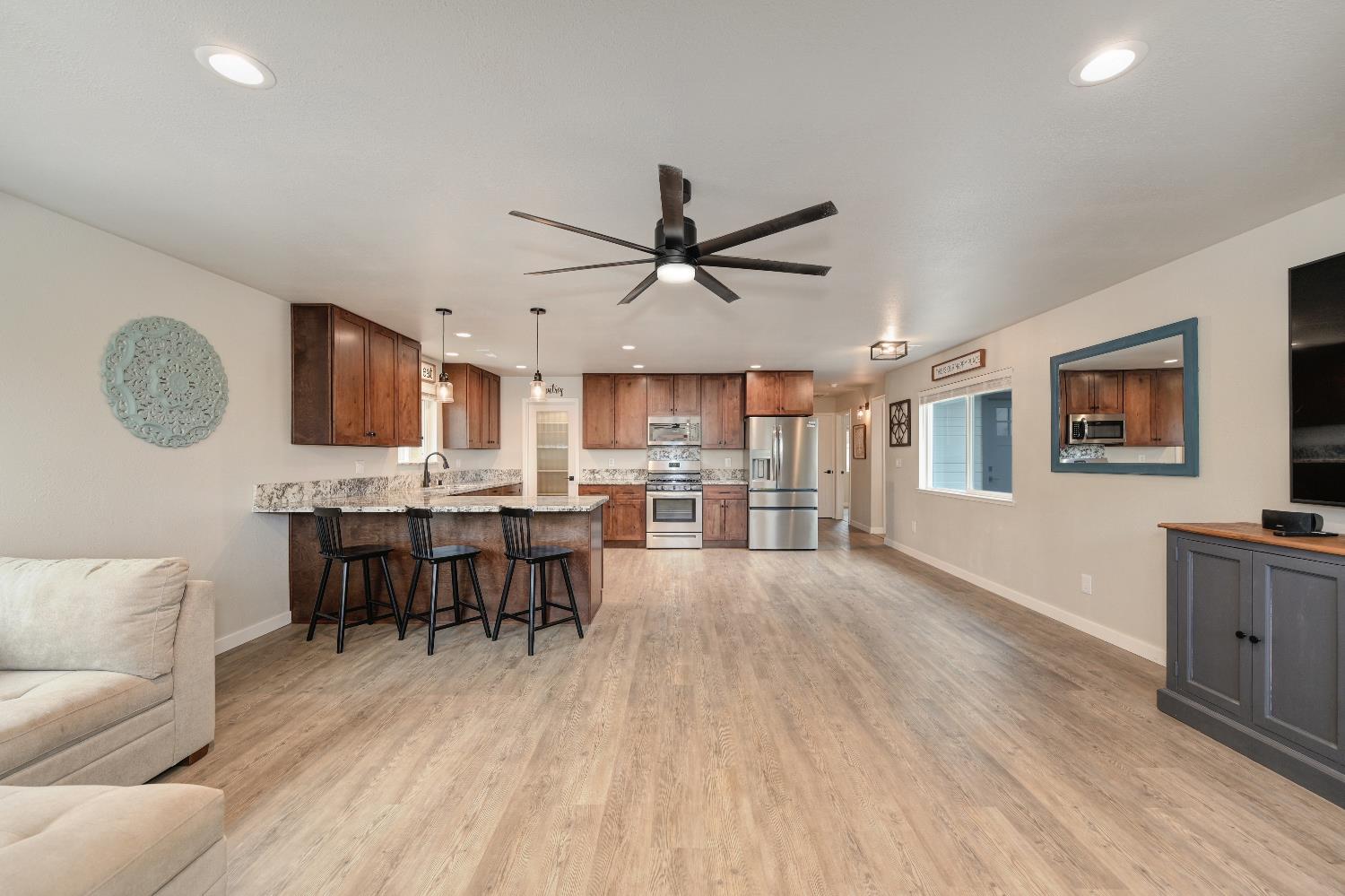 314 East Main Street Ione, CA 95640 - Photo 17 of 43 a view of a livingroom with furniture and a kitchen