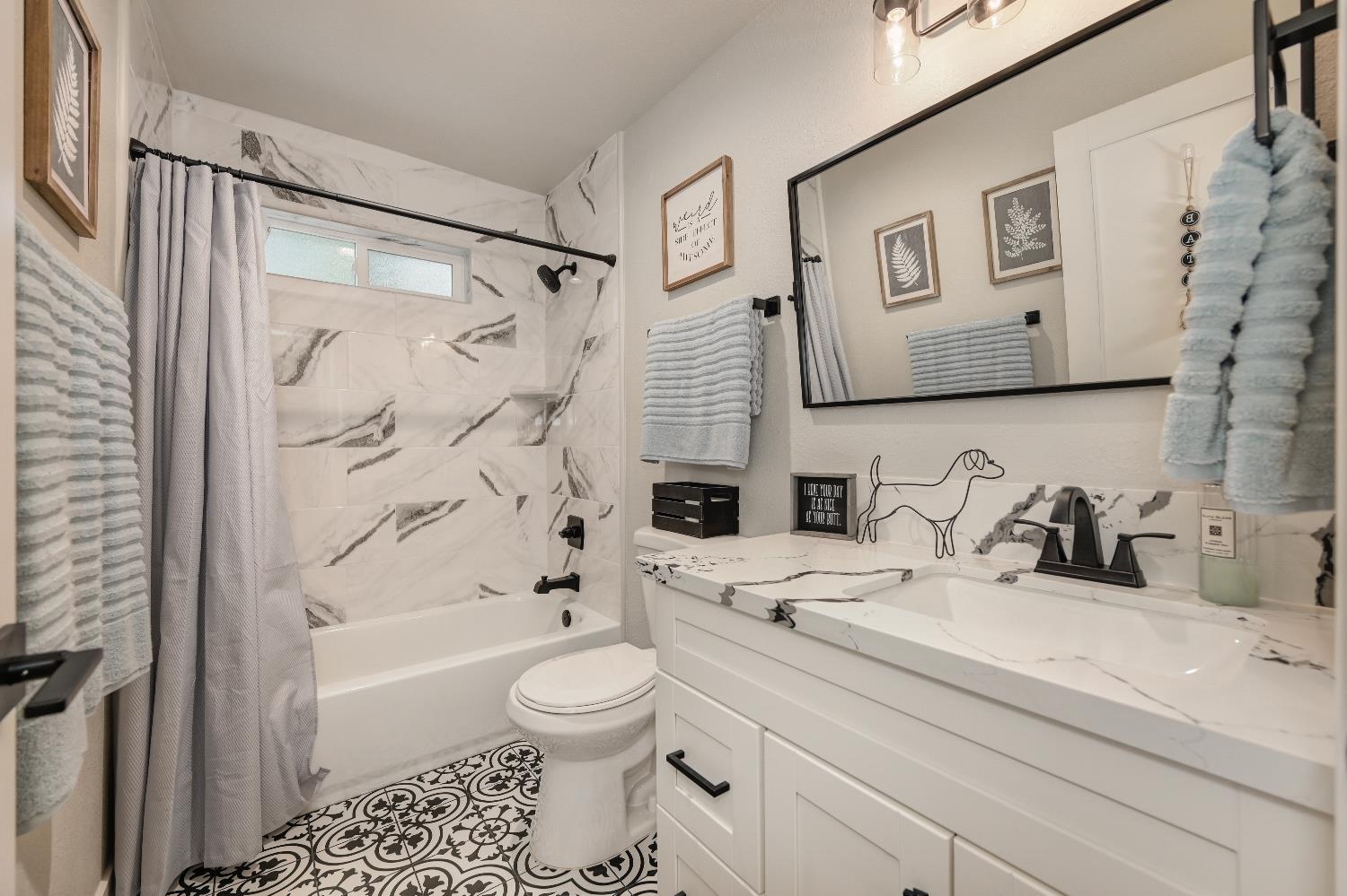 314 East Main Street Ione, CA 95640 - Photo 30 of 43 a bathroom with a sink a toilet and a bathtub