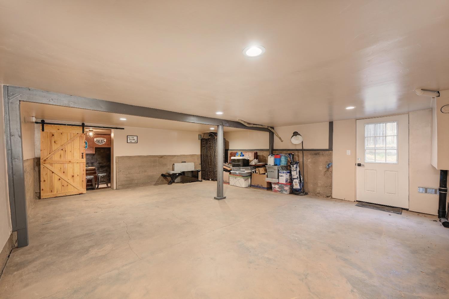 314 East Main Street Ione, CA 95640 - Photo 33 of 43 an empty room with furniture and a view of living room