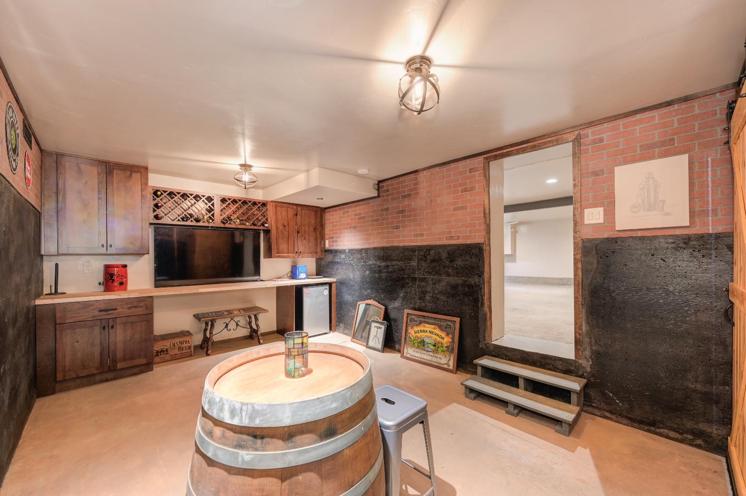 314 East Main Street Ione, CA 95640 - Photo 35 of 43 a living room with furniture and a flat screen tv