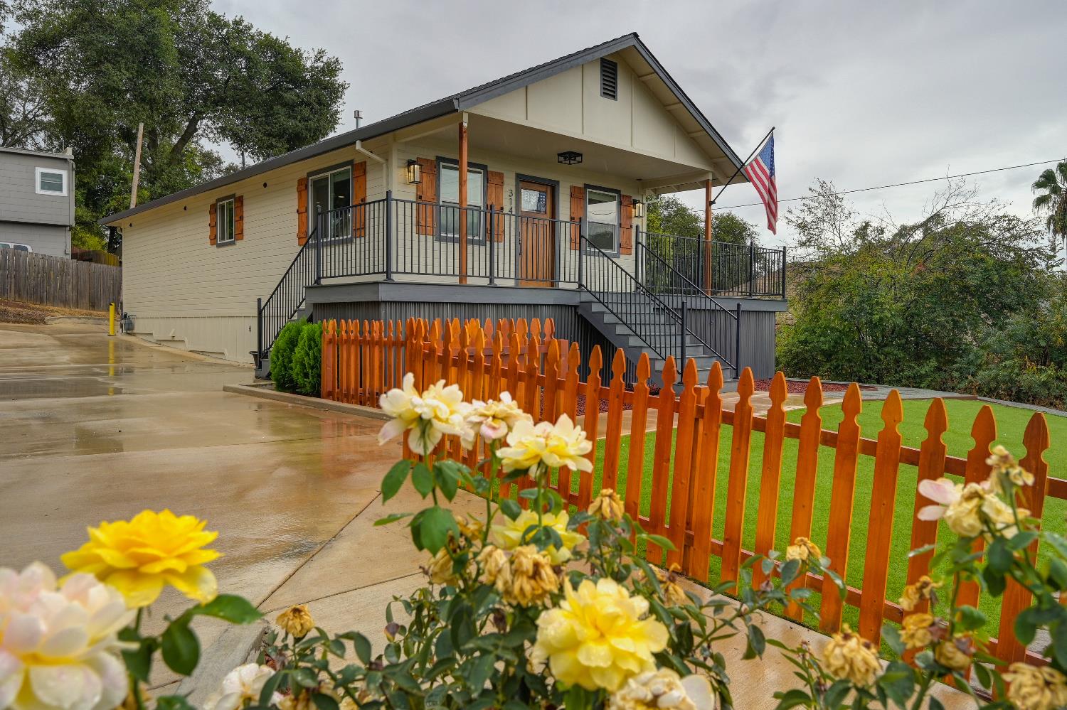 314 East Main Street Ione, CA 95640 - Photo 7 of 43 a front view of a house with a yard