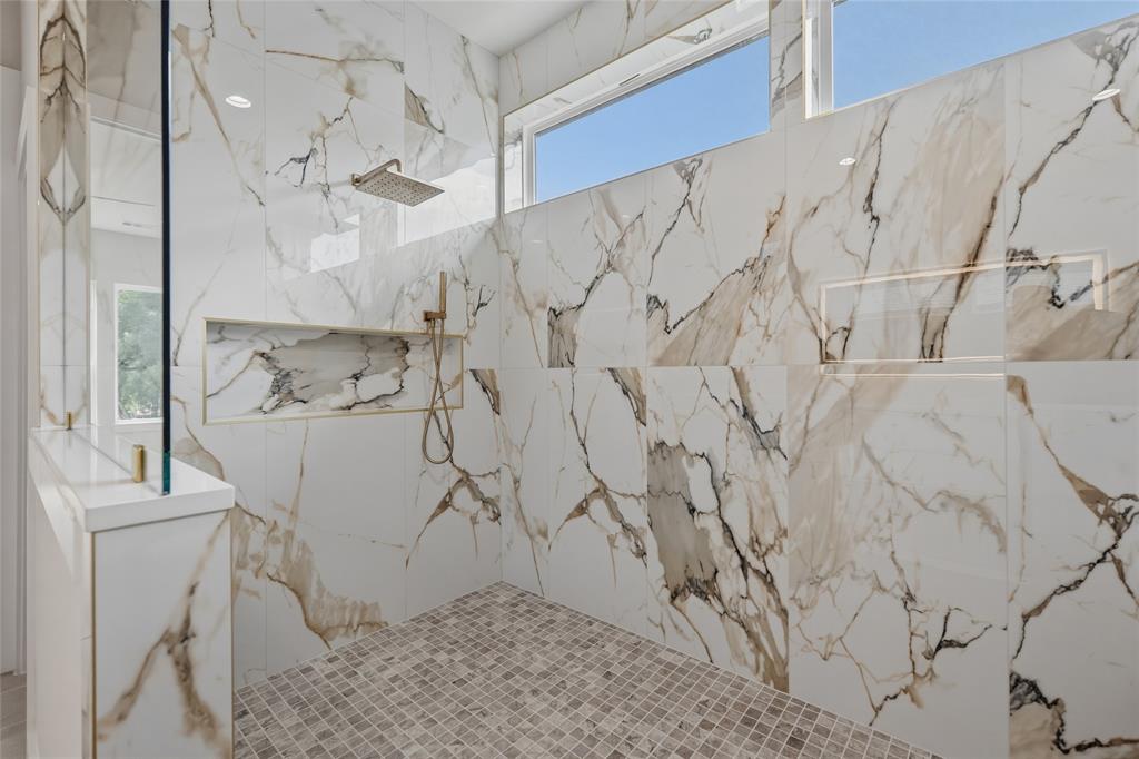 3914 Harlingen Street Dallas, TX 75212 - Photo 23 of 28 a bathroom with a bathtub and shower