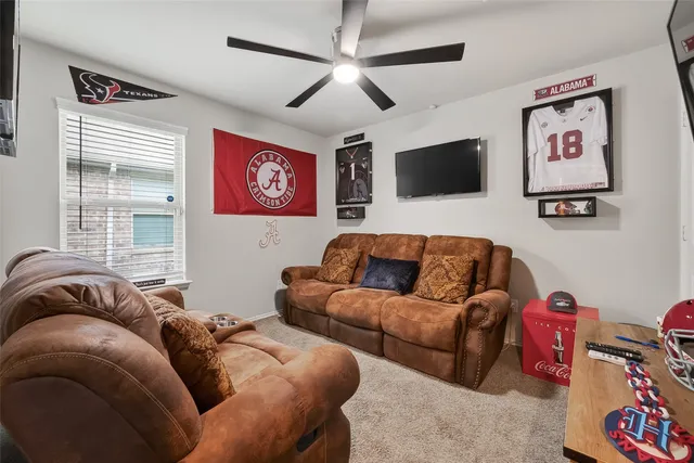 a living room with furniture and a couch