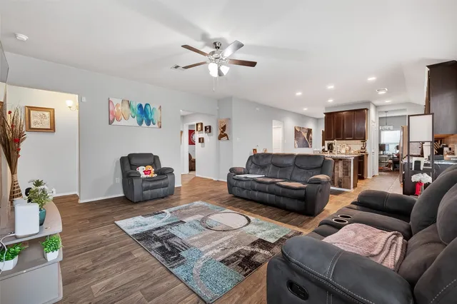 a living room with furniture and a couch