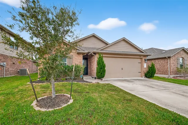 a house view with a garden space