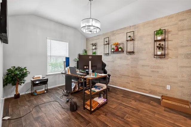 a workspace with wooden floor