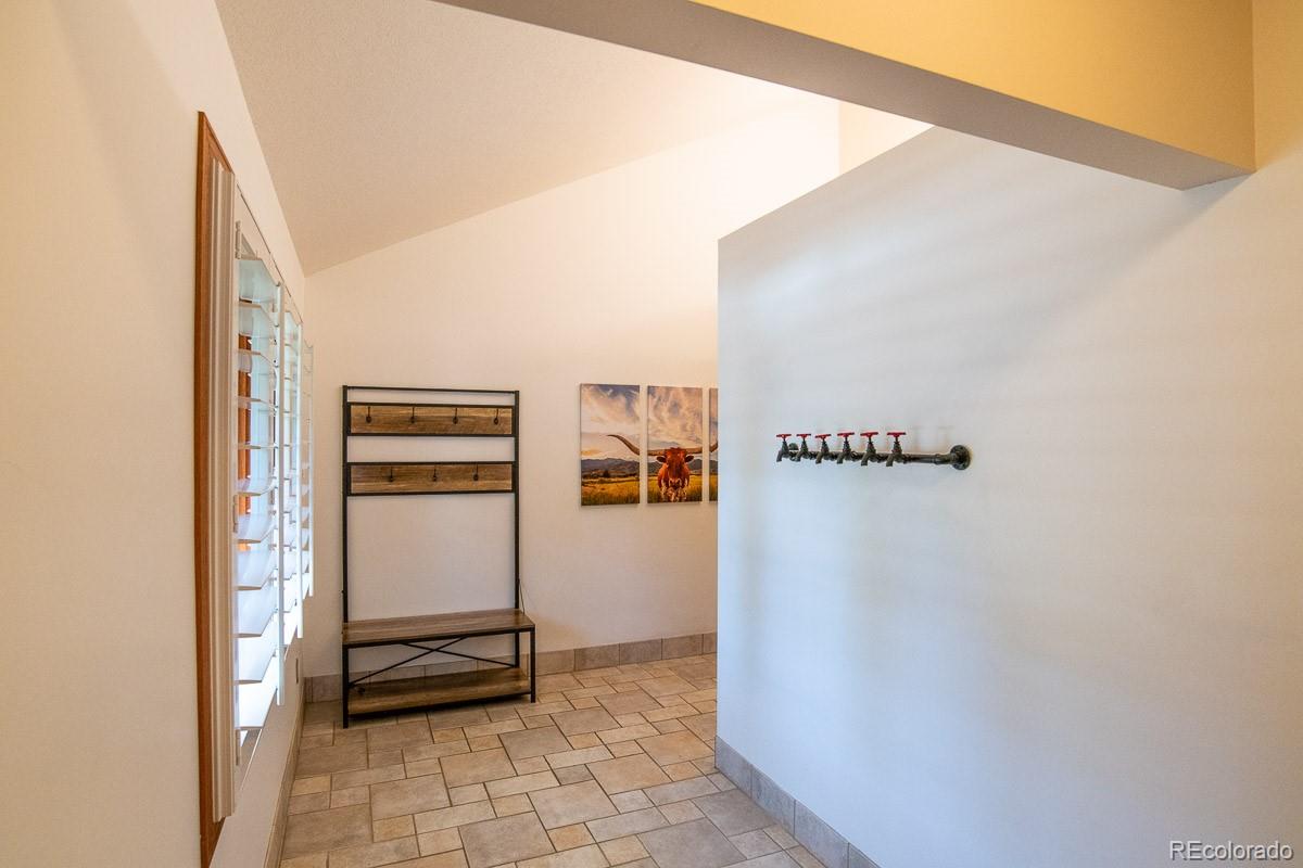 7181 Four Rivers Road Boulder, CO 80301 - Photo 24 of 35 a view of a hallway with closet