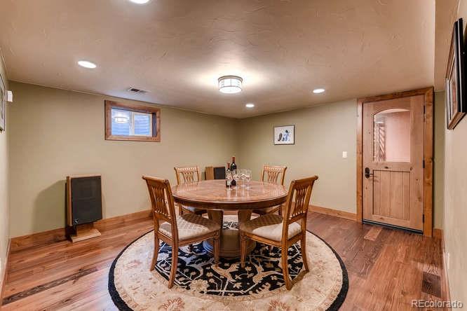 7181 Four Rivers Road Boulder, CO 80301 - Photo 27 of 35 a view of a dining room with furniture