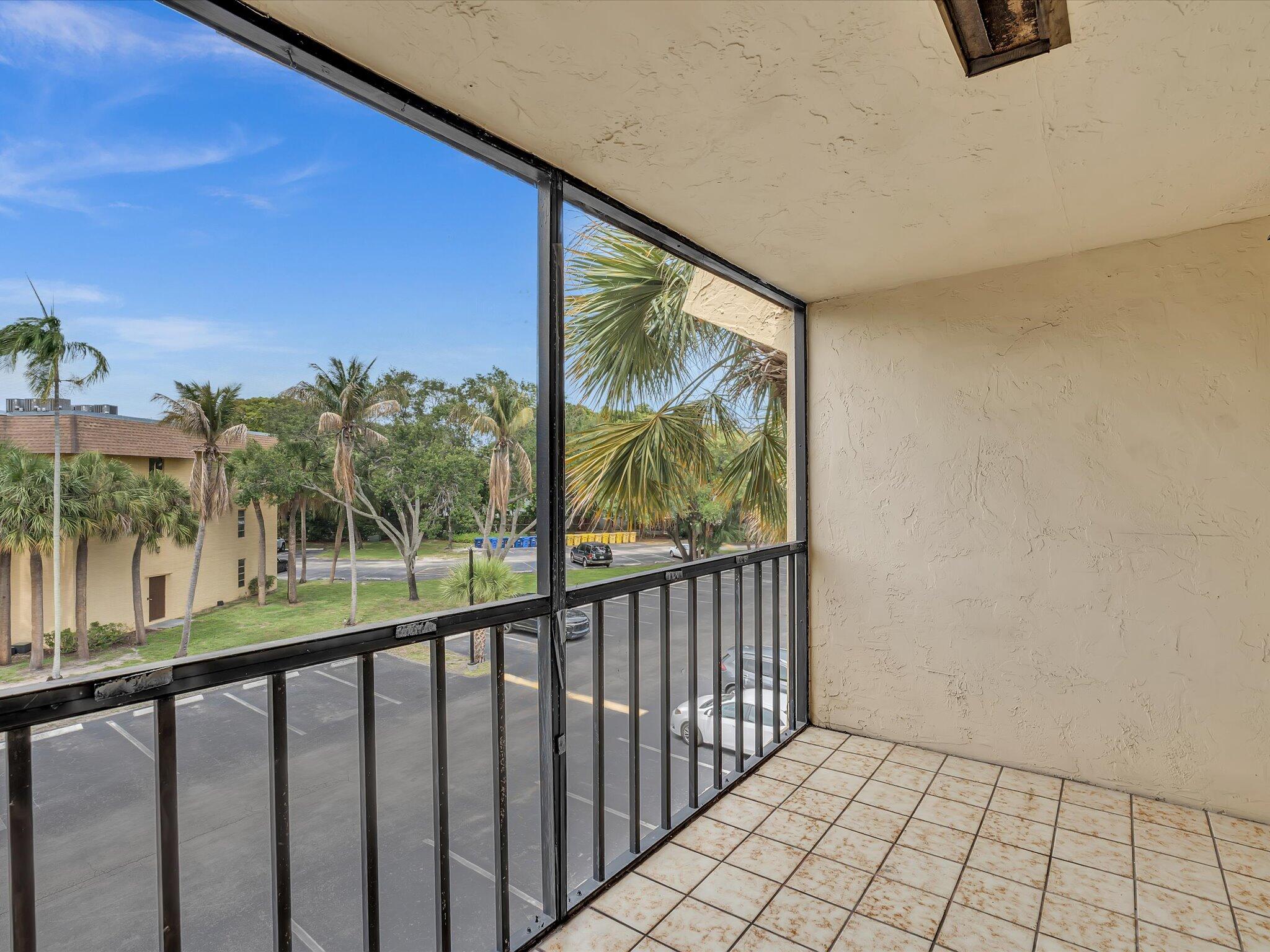 470 Northwest 20th Street, Unit 3020 Boca Raton, FL 33431 - Photo 31 of 43 Screened Balcony