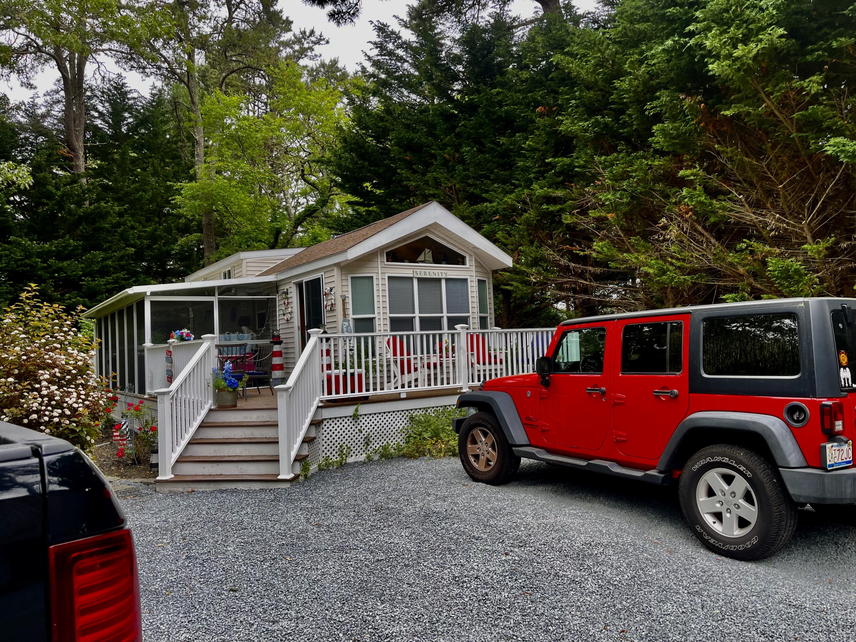 185 Cotuit Road, Unit C5 ASPEN Sandwich, MA 02563 - Photo 4 of 17 a front view of a house with parking space