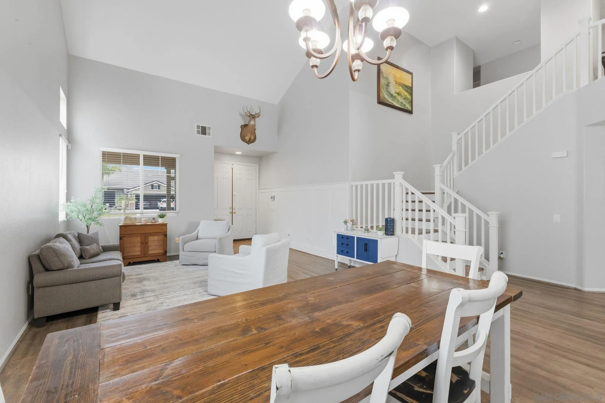 31342 Euclid Loop Winchester, CA 92596 - Photo 11 of 50 a living room with fireplace furniture and a wooden floor