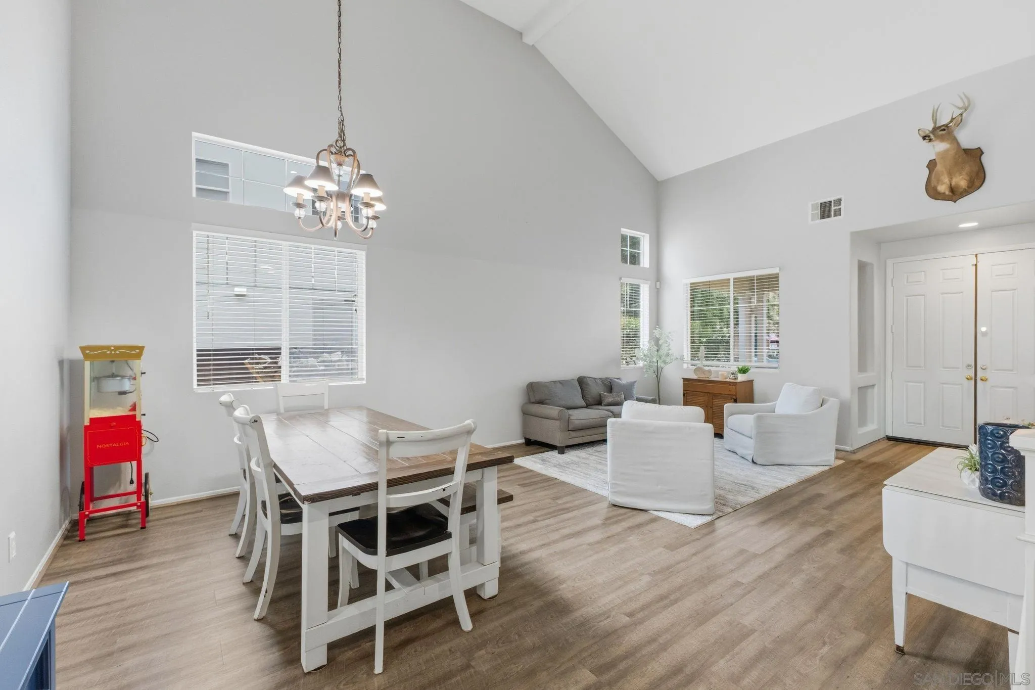 31342 Euclid Loop Winchester, CA 92596 - Photo 12 of 50 a view of a dining room with furniture and wooden floor