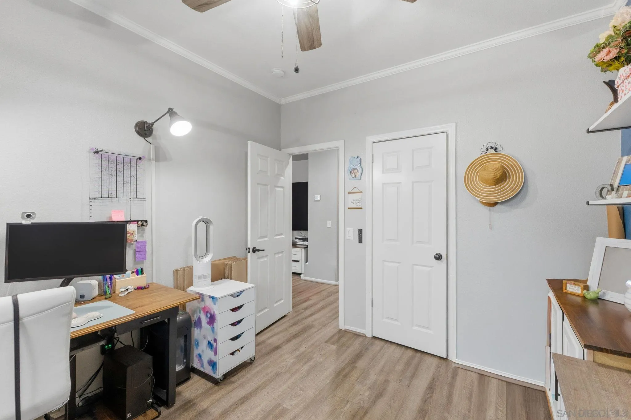 31342 Euclid Loop Winchester, CA 92596 - Photo 22 of 50 a very nice looking room with a big bed and a chandelier