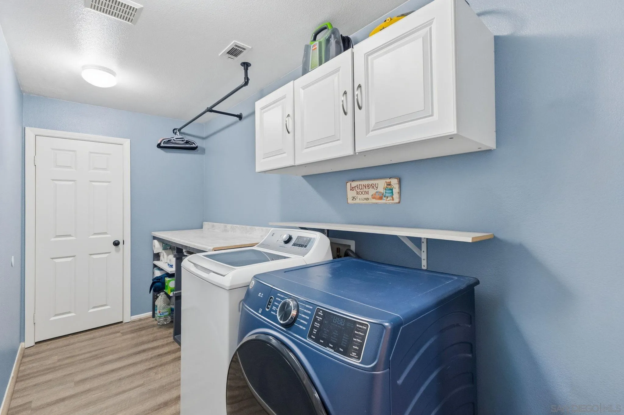 31342 Euclid Loop Winchester, CA 92596 - Photo 24 of 50 a utility room with dryer and washer