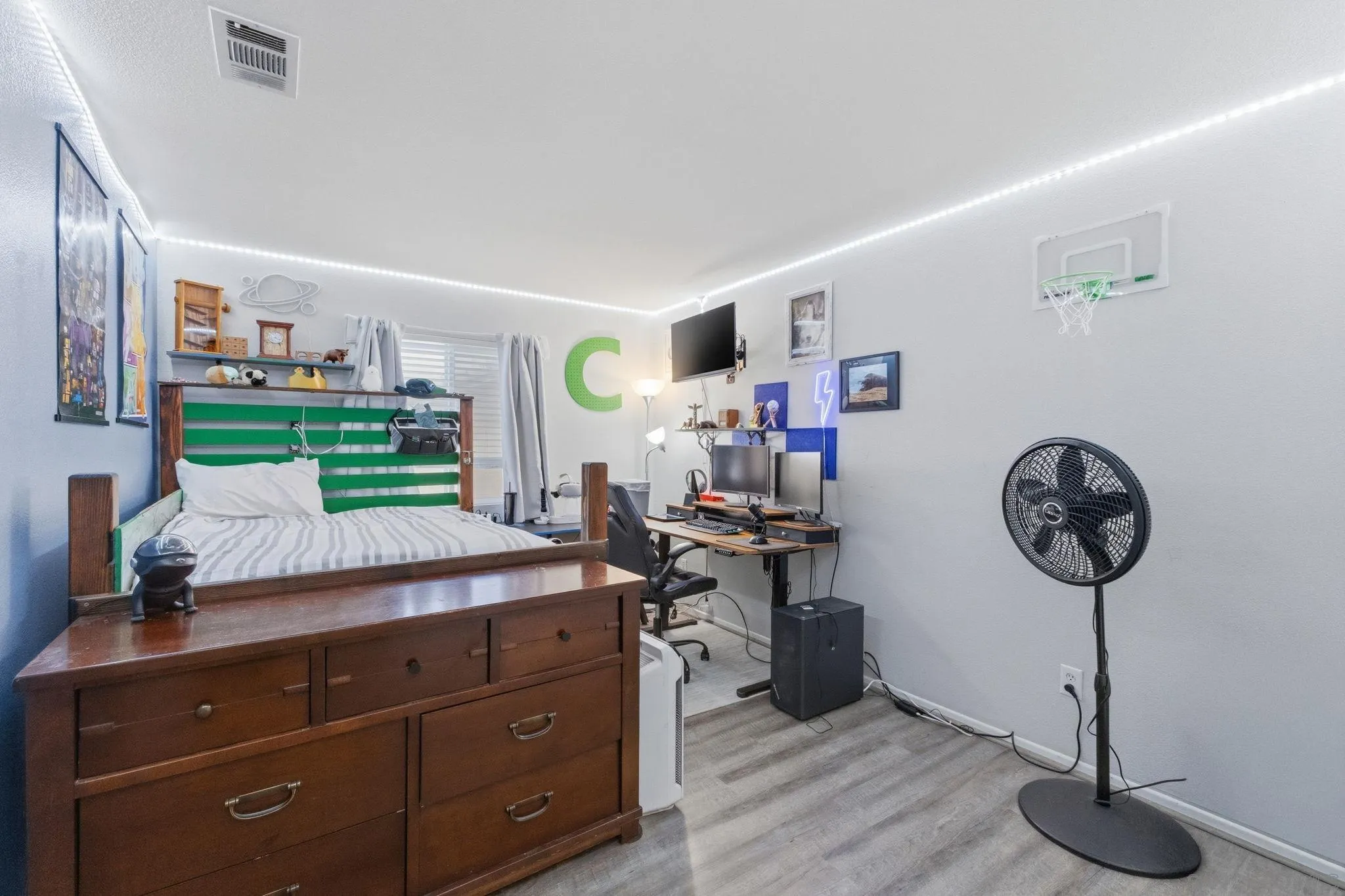 31342 Euclid Loop Winchester, CA 92596 - Photo 28 of 50 a room with a table a clock and stairs