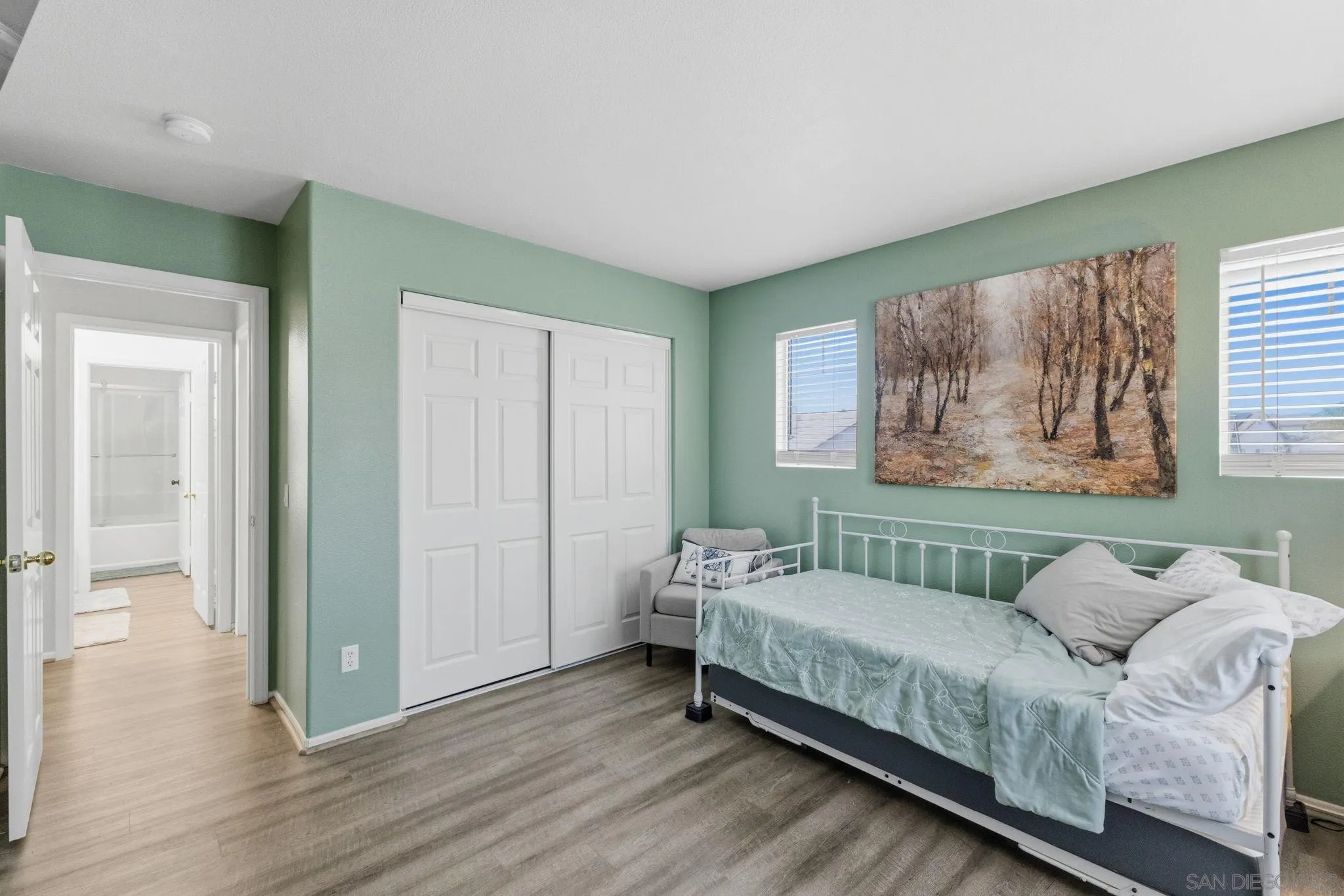31342 Euclid Loop Winchester, CA 92596 - Photo 32 of 50 a bedroom with a bed and a window