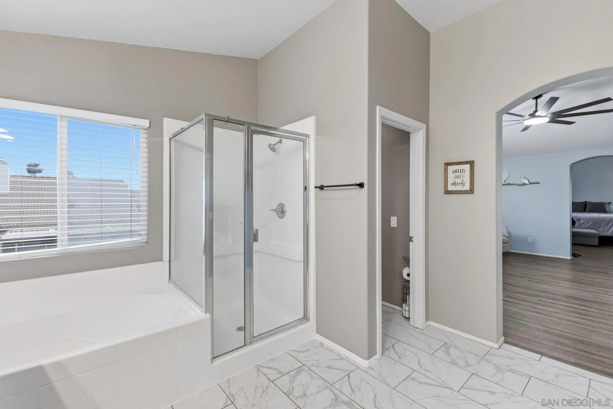 31342 Euclid Loop Winchester, CA 92596 - Photo 36 of 50 a bathroom with a bathtub and a shower