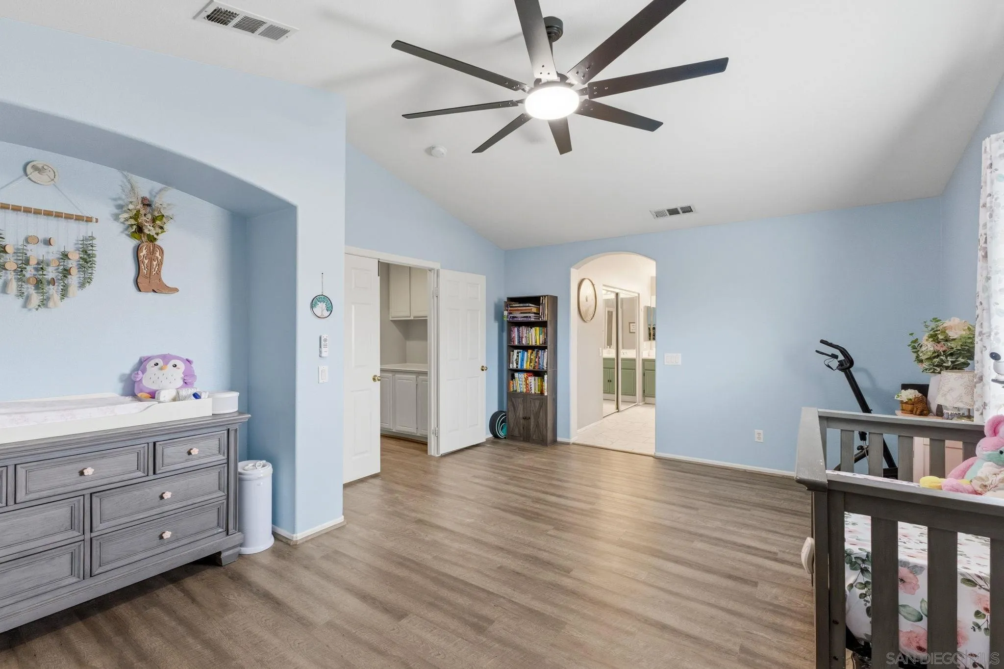 31342 Euclid Loop Winchester, CA 92596 - Photo 40 of 50 a view of a big room with wooden floor closet and windows