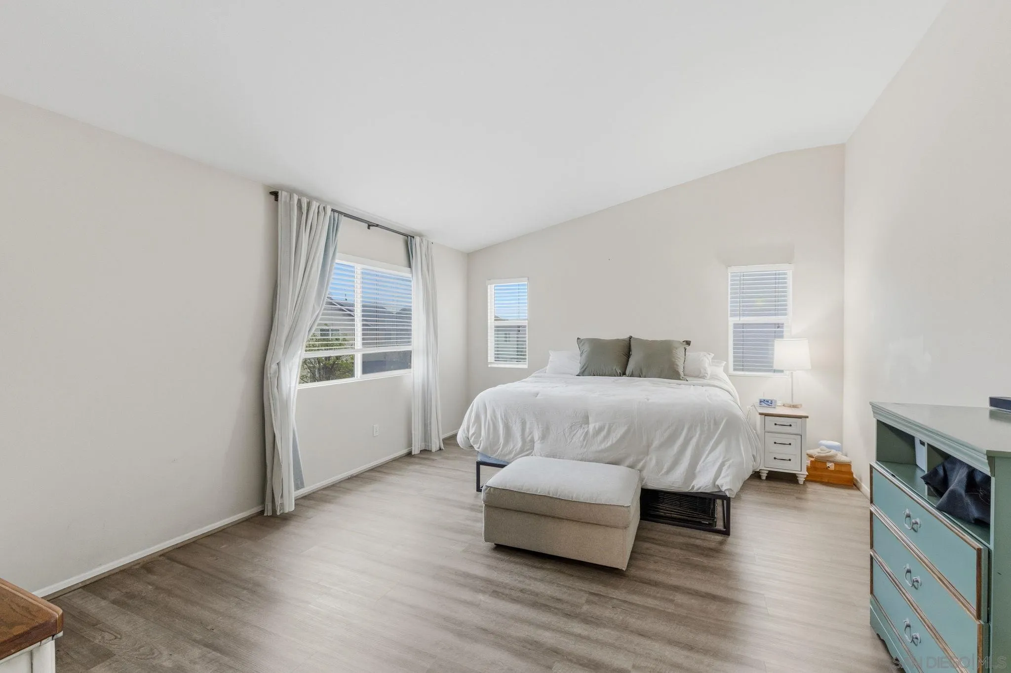 31342 Euclid Loop Winchester, CA 92596 - Photo 41 of 50 a bedroom with a bed and wooden floor