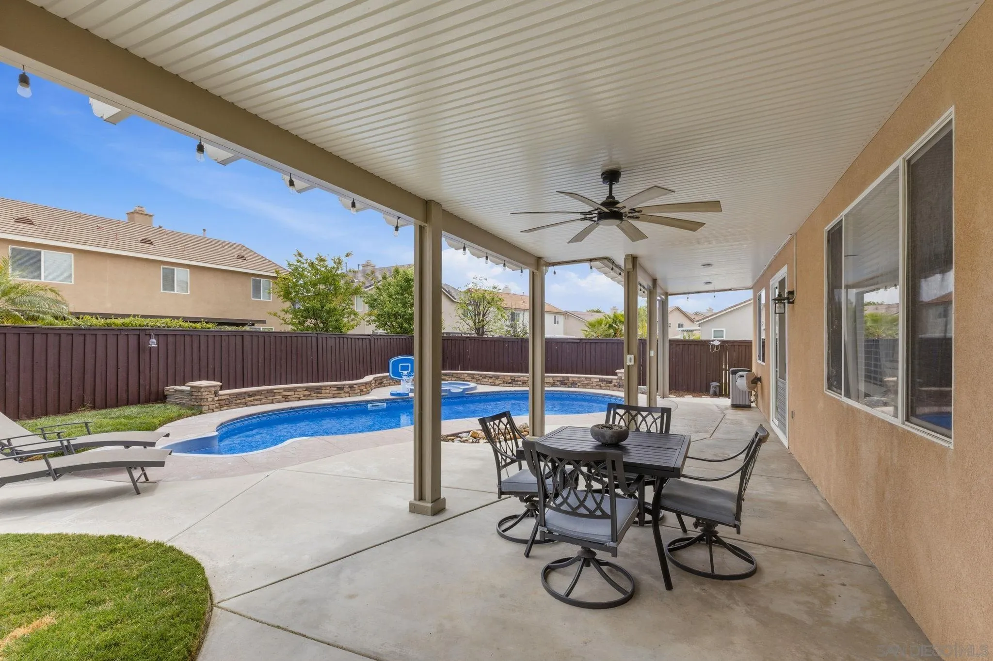 31342 Euclid Loop Winchester, CA 92596 - Photo 45 of 50 a view of a patio with a table and chairs
