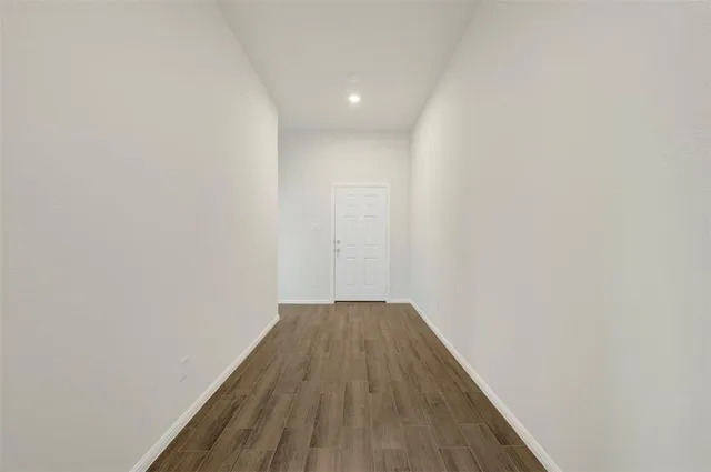 a view of a big room with wooden floor
