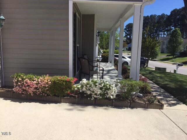 5512 Cardinal Grove Boulevard Raleigh, NC 27616 - Photo 45 of 46 Yard in full bloom in the spring/summer