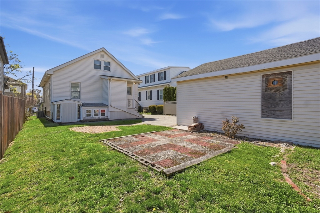 55 Addison Avenue Lynn, MA 01902 - Photo 17 of 23 a view of a house with a yard