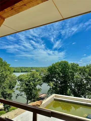 a view of a backyard of the house