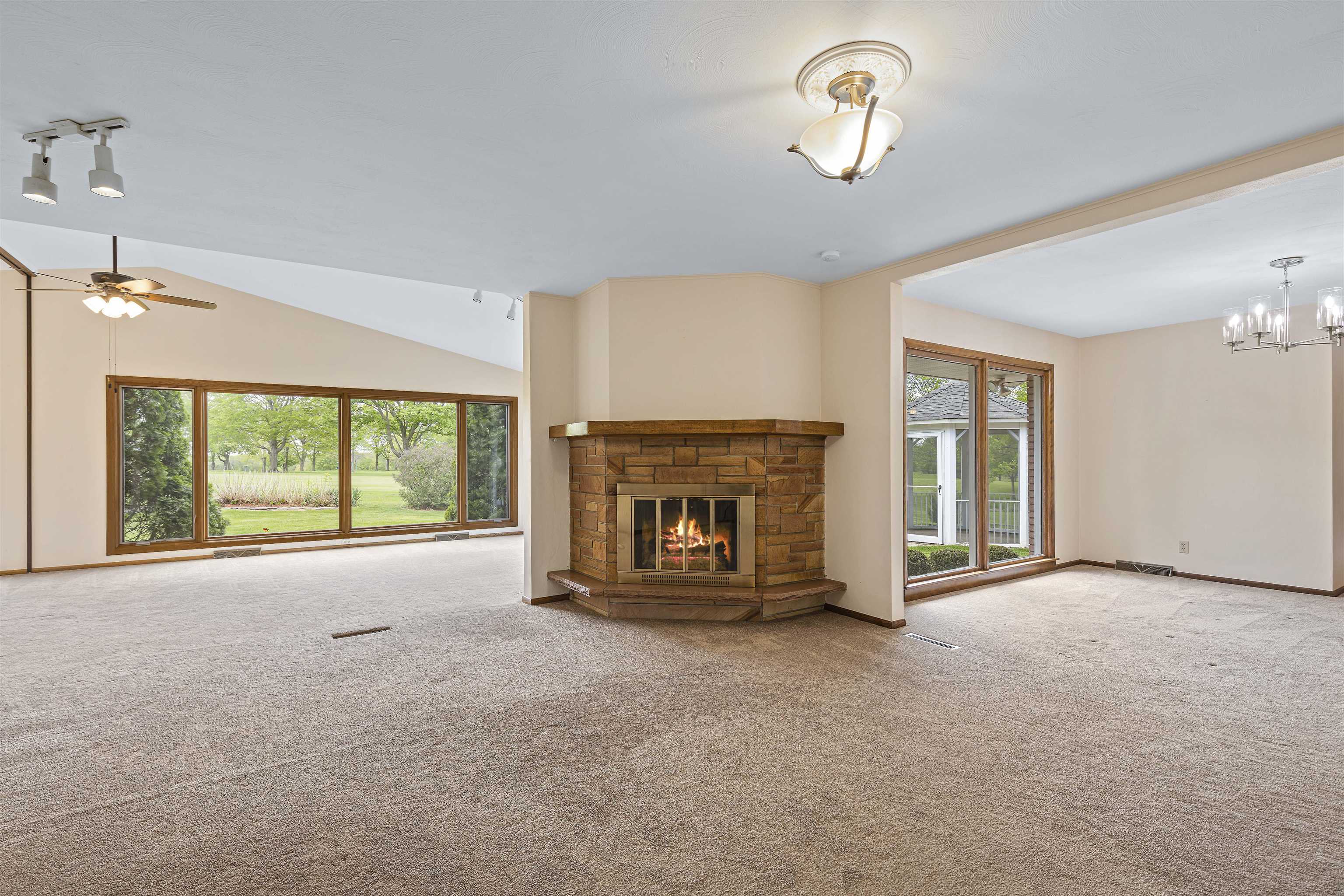 814 Roxbury Road Rockford, IL 61107 - Photo 11 of 36 a view of an empty room with a fireplace