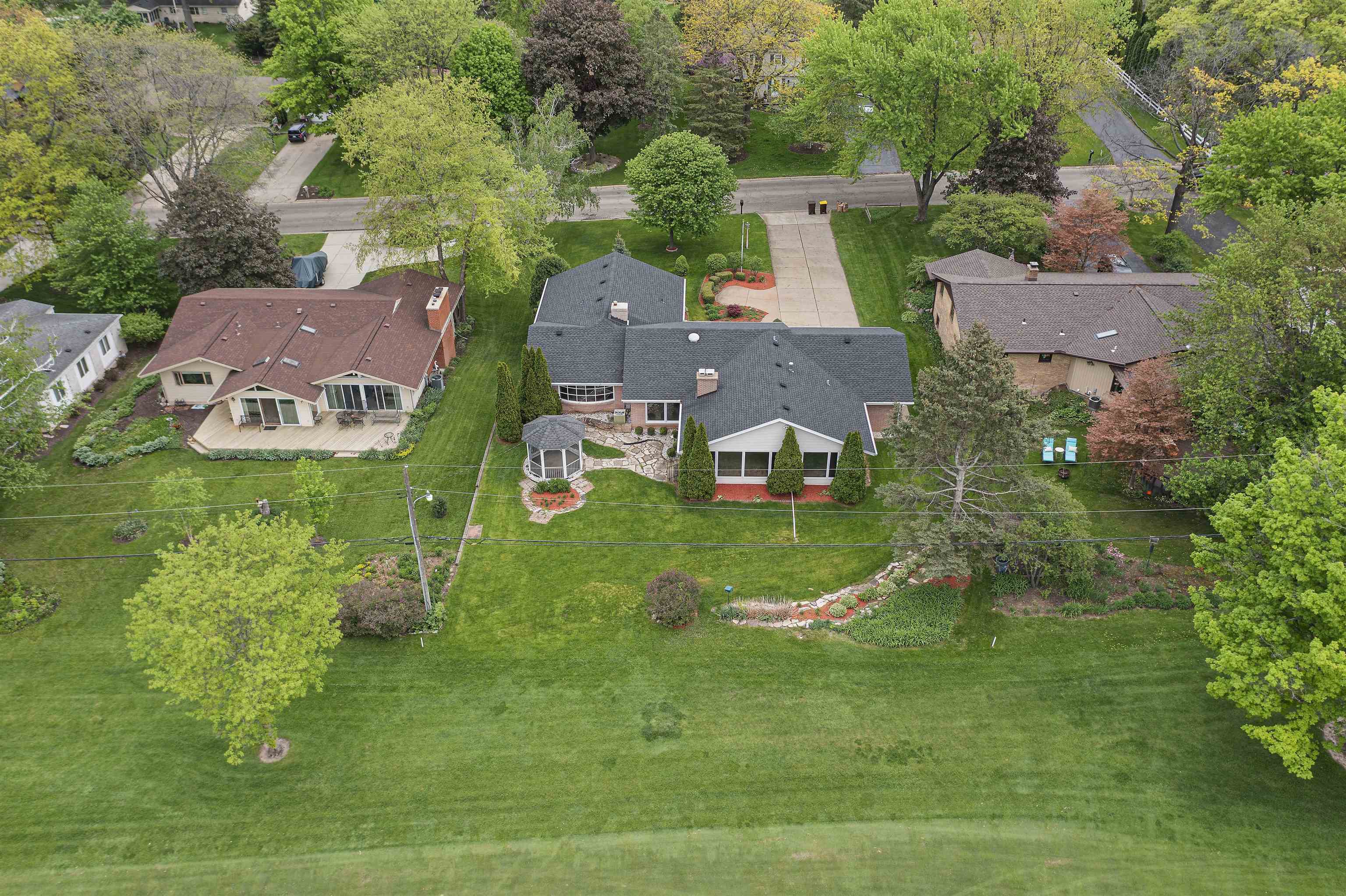 814 Roxbury Road Rockford, IL 61107 - Photo 36 of 36 an aerial view of residential houses with outdoor space and trees all around