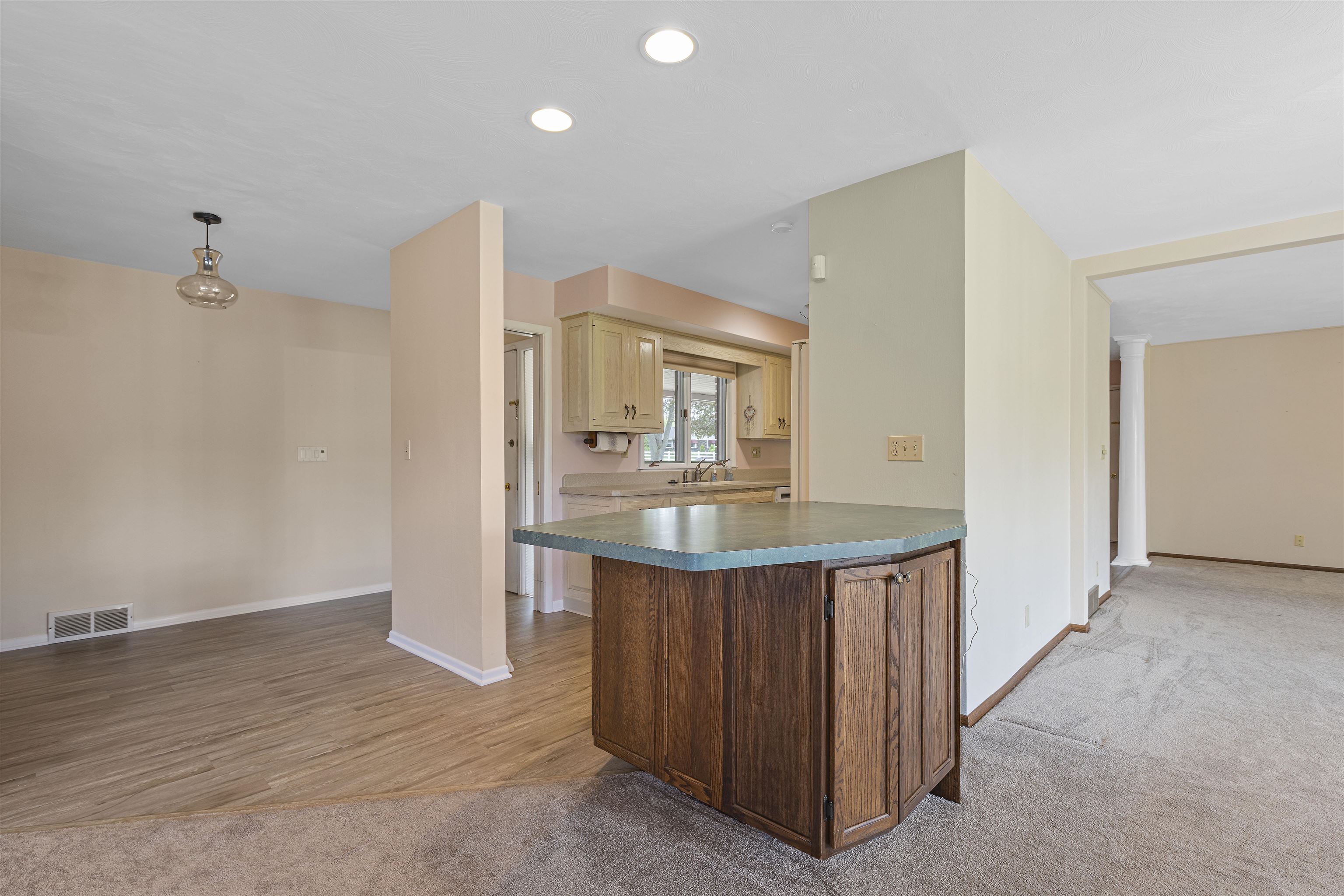 814 Roxbury Road Rockford, IL 61107 - Photo 6 of 36 wooden floor in an empty room with a mirror