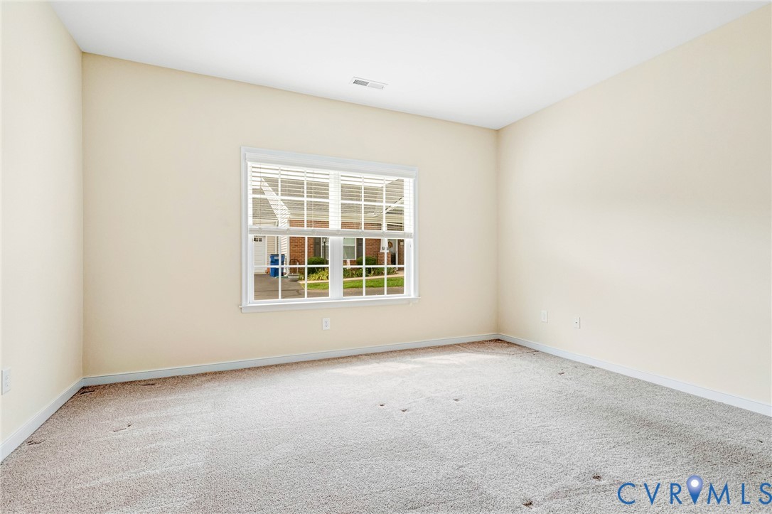 8996 Brigadier Road, Unit 4A Mechanicsville, VA 23116 - Photo 23 of 35 an empty room with a window
