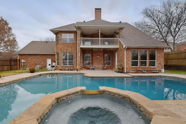 a view of a house with a swimming pool