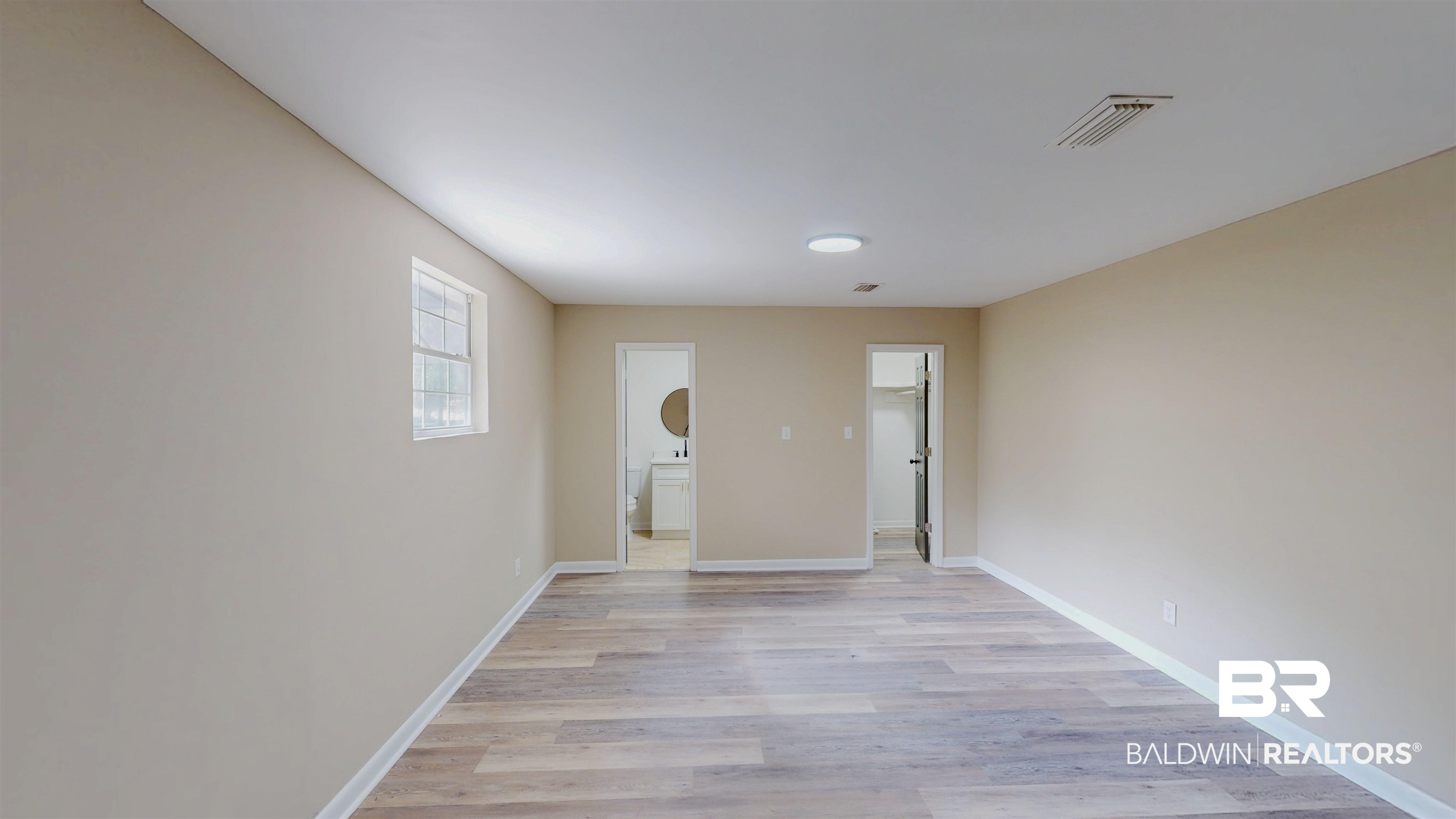 22711 Highway 98 Foley, AL 36535 - Photo 38 of 74 Spare room with light wood-type flooring and baseboards