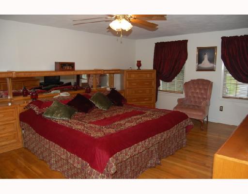 155 Pound Road Cumberland, RI 02864 - Photo 3 of 8 Master Bedroom. Large master bedroom features 2 closets, hardwood floors and it s own private (and huge) bathroom with jacuzzi tub.