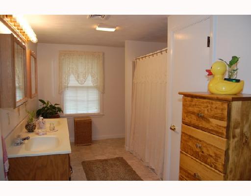 155 Pound Road Cumberland, RI 02864 - Photo 8 of 8 Other. Second-floor bathroom is oversized and offers a double vanity.