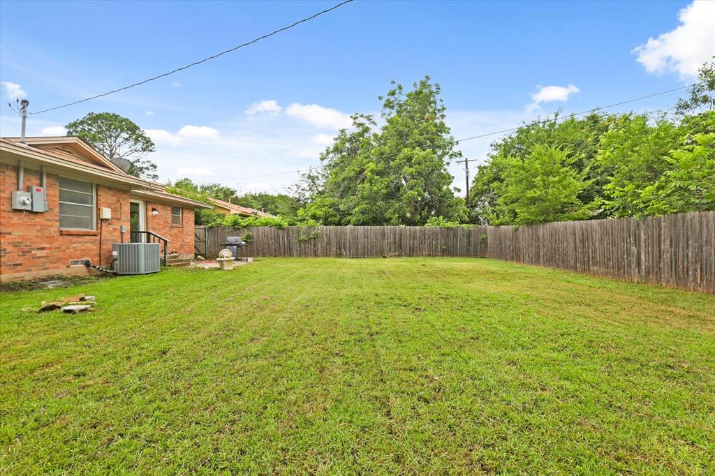 1716 Cordell Street Denton, TX 76201 - Photo 17 of 18 front view of a house with a yard