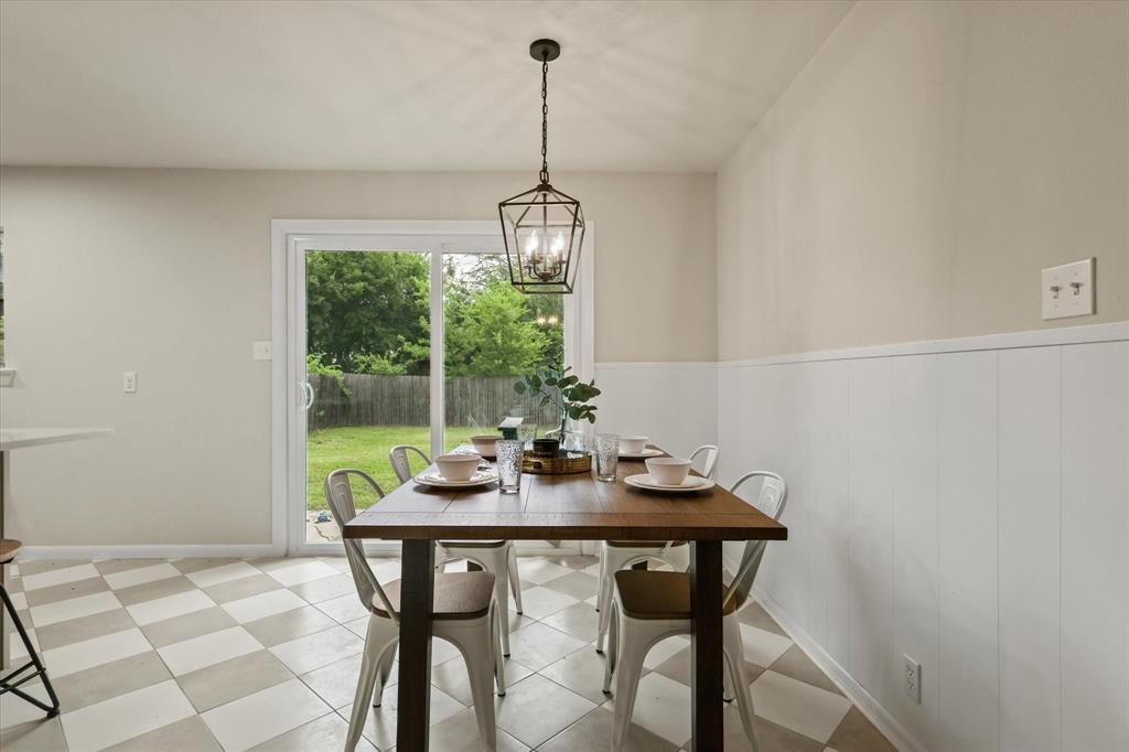 1716 Cordell Street Denton, TX 76201 - Photo 7 of 18 a view of a dining room with furniture window and outside view