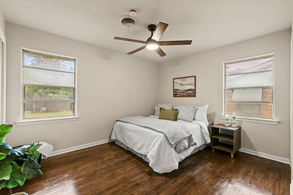 1716 Cordell Street Denton, TX 76201 - Photo 10 of 18 a bedroom with a bed table and window