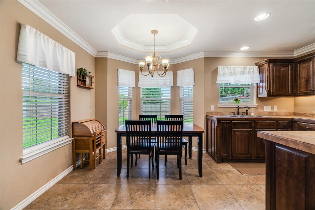 1810 Meadowview Drive Reno, TX 75462 - Photo 4 of 17 a view of a dining room with furniture window and outside view